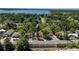 Aerial view of property near lake with trees and other homes at 3914 W Robinson St, Orlando, FL 32805
