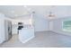 Bright open living area with an eat-in kitchen, stainless appliances, and vinyl flooring at 4911 Ne 7Th St, Ocala, FL 34470