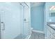 Updated shower with tiled walls and glass door at 4911 Ne 7Th St, Ocala, FL 34470