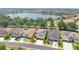 Neighborhood aerial showcasing the surrounding community near a large lake at 561 Gunston Ct, Davenport, FL 33837
