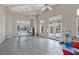 Clubhouse features high ceilings, ceiling fans, tile floors, large windows, a ping pong table, and play area at 561 Gunston Ct, Davenport, FL 33837