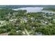 An aerial shot shows the home's tranquil neighborhood, located near a beautiful lake at 7330 Canal Dr, Sanford, FL 32771