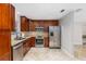 Beautiful kitchen featuring stainless steel appliances, granite countertops, and plentiful cabinet space at 7330 Canal Dr, Sanford, FL 32771