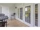 Inviting balcony features seating with view of exterior, perfect for relaxing and entertaining at 7615 Heritage Crossing Way # 201, Reunion, FL 34747