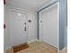 Welcoming entrance with elevator access, tiled floor, and convenient unit number signage at 7615 Heritage Crossing Way # 201, Reunion, FL 34747