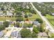 Spacious suburban home featuring a lush landscape and a serene pond in a Gathering-friendly neighborhood at 7939 Winter Song Dr, Orlando, FL 32825