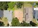 Aerial view of the home showing the roof, yard and surrounding neighborhood at 7939 Winter Song Dr, Orlando, FL 32825