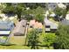 This home features a sprawling lawn, fenced yard and mature trees offering privacy and outdoor enjoyment at 7939 Winter Song Dr, Orlando, FL 32825