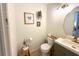 Cozy half bathroom with a modern sink and decorative accents creating a charming space at 7939 Winter Song Dr, Orlando, FL 32825