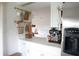 Kitchen features a bar with an espresso machine, stainless steel appliances and natural light at 7939 Winter Song Dr, Orlando, FL 32825