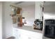 View of bright kitchen with stainless steel appliances and an espresso machine at 7939 Winter Song Dr, Orlando, FL 32825