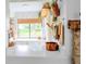 Bright kitchen features white quartz counters, wood accents, and backyard views at 7939 Winter Song Dr, Orlando, FL 32825