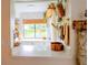 Bright kitchen with a view of the backyard through the window, and wood accents at 7939 Winter Song Dr, Orlando, FL 32825