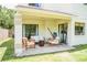 Covered patio with comfortable seating, perfect for outdoor relaxation and entertaining at 7939 Winter Song Dr, Orlando, FL 32825