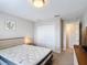 Neutral bedroom featuring double door closet with connected bathroom at 850 Pebble Beach Dr, Davenport, FL 33896
