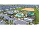 Aerial view of the community pool and recreation area, featuring slides, a lazy river, and lounge areas at 850 Pebble Beach Dr, Davenport, FL 33896