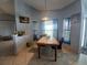 Cozy dining room with tile flooring, offering an ideal space for Gathering meals and casual gatherings at 8509 Sw 136Th Loop, Ocala, FL 34473