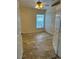 Cozy bedroom with tile floors, window, and closet at 9003 Pecky Cypress Way, Orlando, FL 32836