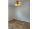 Bedroom with tile floors, ceiling fan with light and neutral wall color at 9003 Pecky Cypress Way, Orlando, FL 32836