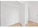 Walk-in closet featuring wire shelving, tiled floor, and white walls at 9003 Pecky Cypress Way, Orlando, FL 32836