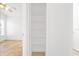 Walk-in closet featuring wire shelving, tiled floor, and white walls at 9003 Pecky Cypress Way, Orlando, FL 32836