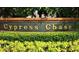 Entrance sign to Cypress Chase community with manicured shrubs at 9003 Pecky Cypress Way, Orlando, FL 32836
