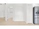 Bright entryway featuring neutral tile flooring and a convenient coat closet at 9003 Pecky Cypress Way, Orlando, FL 32836
