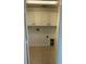Laundry room with cabinets, tiled floors, and hookups at 9003 Pecky Cypress Way, Orlando, FL 32836