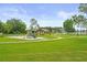 Community park featuring playground, gazebo, athletic fields and green space at 9003 Pecky Cypress Way, Orlando, FL 32836