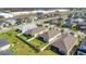 Neighborhood aerial view showcasing well-kept lawns, mature trees, and a desirable suburban setting at 913 Sabal Breeze Ln, Apopka, FL 32703