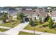 An elevated view of a well-maintained, single-Gathering home with a neatly manicured lawn and landscaping at 913 Sabal Breeze Ln, Apopka, FL 32703