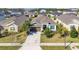 Charming single-story home with a well-maintained lawn, a two-car garage, and attractive landscaping at 913 Sabal Breeze Ln, Apopka, FL 32703