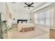 Bright main bedroom featuring recessed lighting, and a large window at 913 Sabal Breeze Ln, Apopka, FL 32703