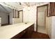 Bathroom featuring a vanity and a view of the tiling in the bathtub area at 9206 Everwood St, Orlando, FL 32825