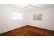 Bedroom featuring neutral walls and two windows that offer natural light at 9206 Everwood St, Orlando, FL 32825
