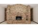Grand brick fireplace with raised hearth and decorative brick accents at 9206 Everwood St, Orlando, FL 32825