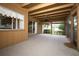 Covered and screened-in patio offering a relaxing outdoor space at 9206 Everwood St, Orlando, FL 32825