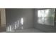 Bright bedroom featuring lots of natural light from the large window at 958 Salt Pond Pl # 103, Altamonte Springs, FL 32714