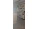 Functional kitchen featuring white appliances and ample cabinet space at 958 Salt Pond Pl # 103, Altamonte Springs, FL 32714
