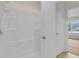 Clean bathroom with white shower and bathroom fixtures, offering a bright and functional space at 978 Calanda Ave, Orlando, FL 32807