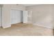Bedroom featuring carpet, closet, and entry to another room at 978 Calanda Ave, Orlando, FL 32807