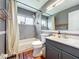 Bathroom with shower-tub, vanity and tile floor at 1044 Dees Dr, Oviedo, FL 32765