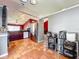 Open-concept kitchen featuring stainless appliances, tile floors, overhead lighting and adjoined to dining room at 1044 Dees Dr, Oviedo, FL 32765