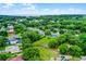 Sprawling single-Gathering neighborhood with mature trees, well-manicured lawns, and views of the ocean at 1113 Canopy Oaks Dr, Minneola, FL 34715