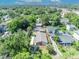 Aerial view of the home, highlighting its location amidst lush greenery and neighborhood amenities at 1310 Oregon St, Orlando, FL 32803