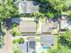 Aerial shot of the home's roof, driveway, yard and surrounding neighborhood at 1310 Oregon St, Orlando, FL 32803