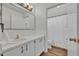 Bathroom with white vanity, wood flooring and shower at 1310 Oregon St, Orlando, FL 32803