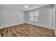 Bedroom with wood flooring and ceiling fan at 1310 Oregon St, Orlando, FL 32803