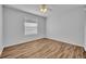 Bedroom with wood flooring and ceiling fan at 1310 Oregon St, Orlando, FL 32803