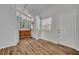 Bright kitchen with wooden cabinets, ample countertop space, and wood-look flooring at 1310 Oregon St, Orlando, FL 32803